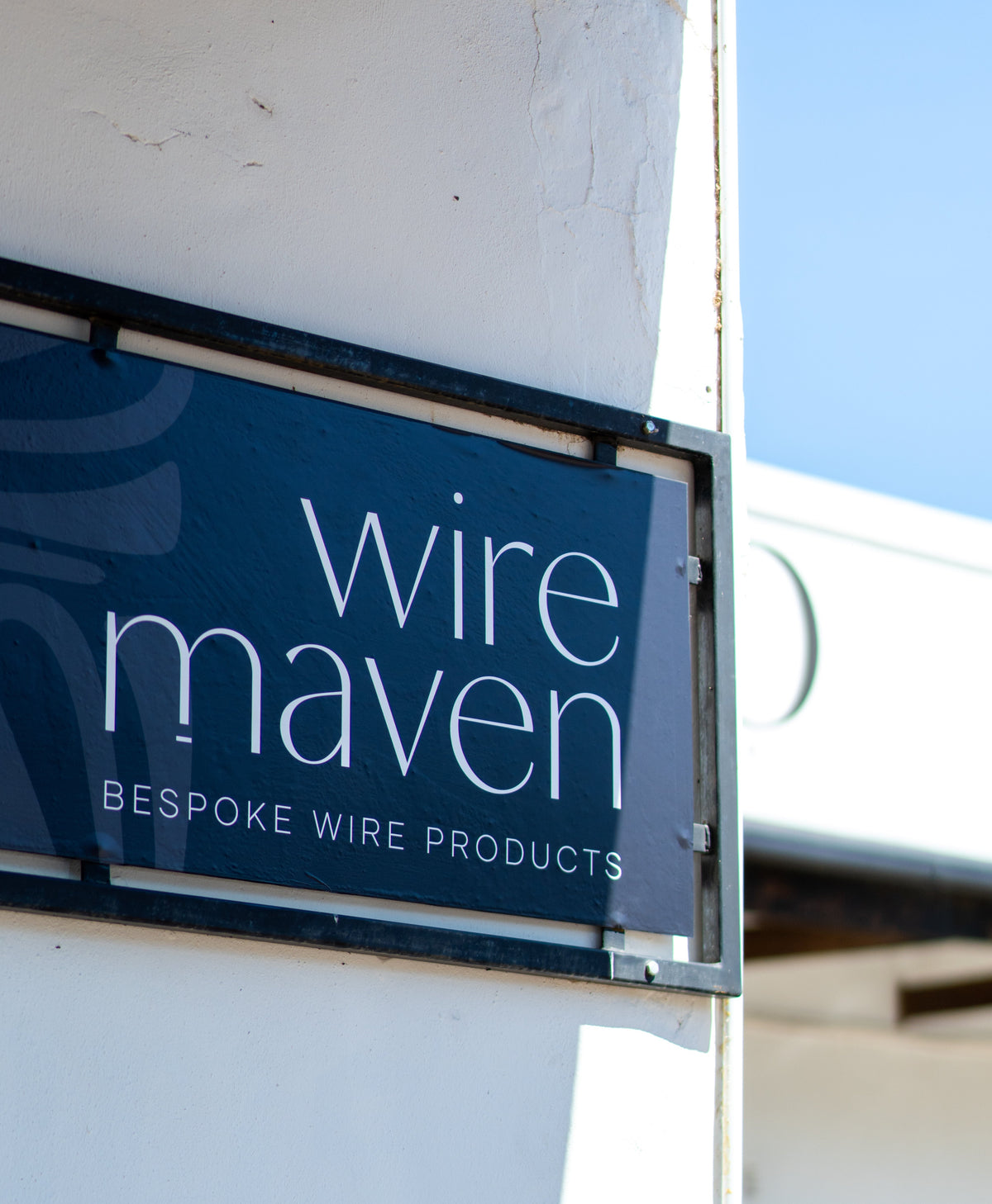 Wire Maven sign on a building exterior